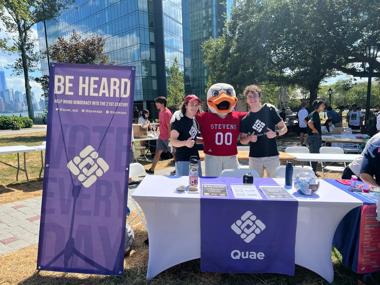Quae booth at an outdoor campus event
