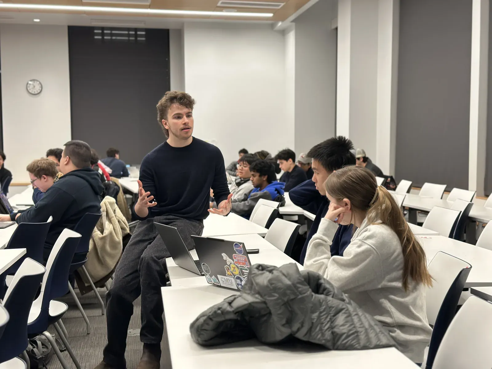 Samuel Schmitt presenting during a Sail agent-building workshop at Stevens